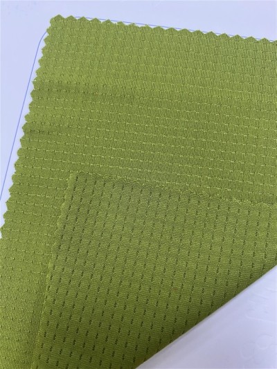 GZ-YXYF 3210# Elastic Shell Net Width: 170CM Weight: 170GSM Composition: 10%spandex 90%polyester Moisture wicking side view